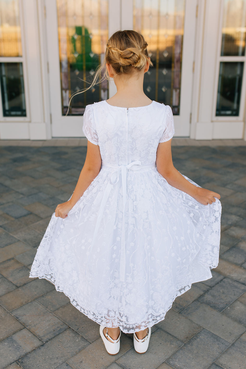 girl in white lace dress