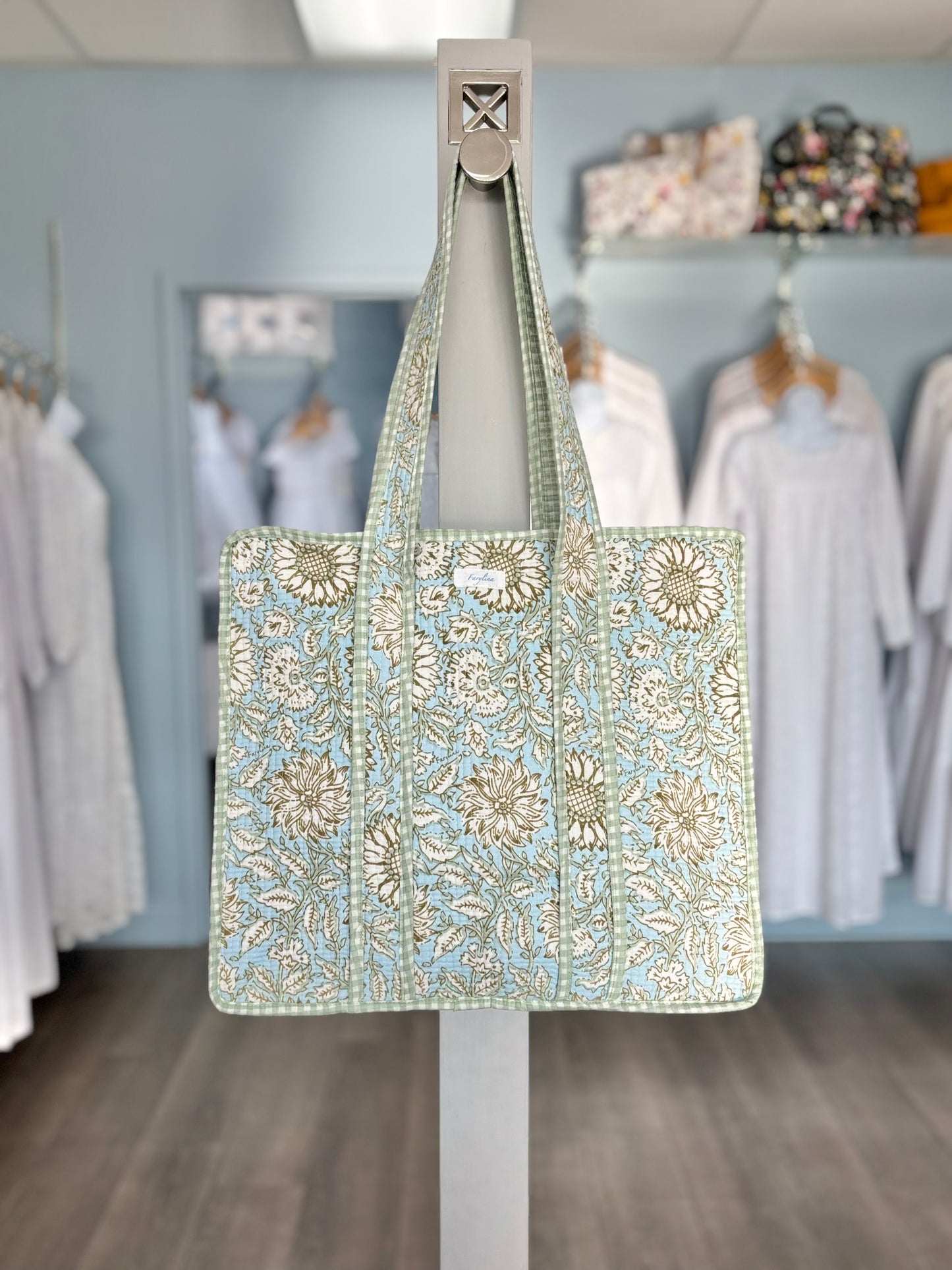 green and blue quilted bag