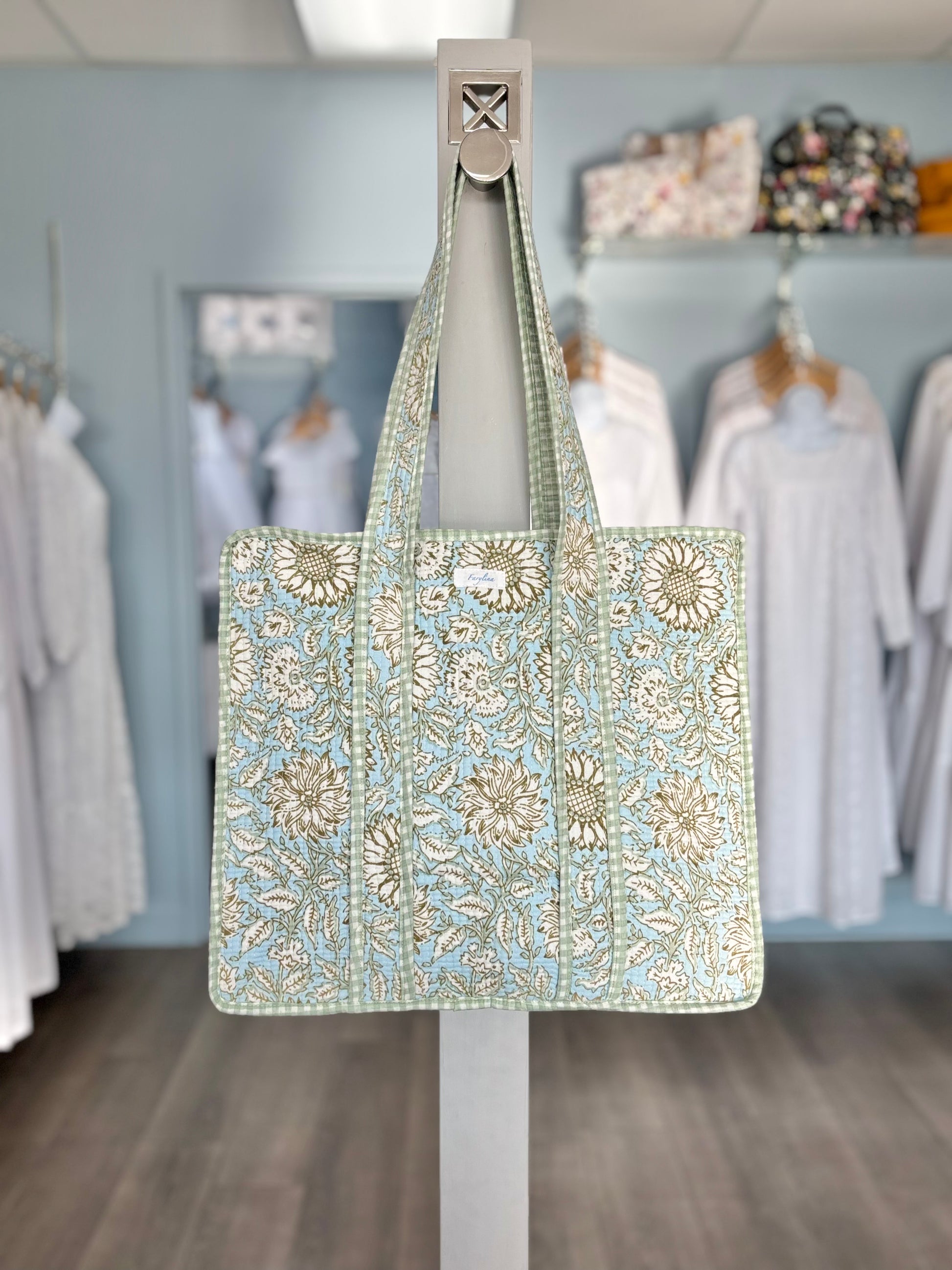 green and blue quilted bag