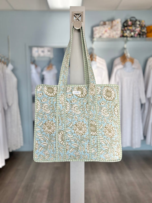 green and blue quilted bag