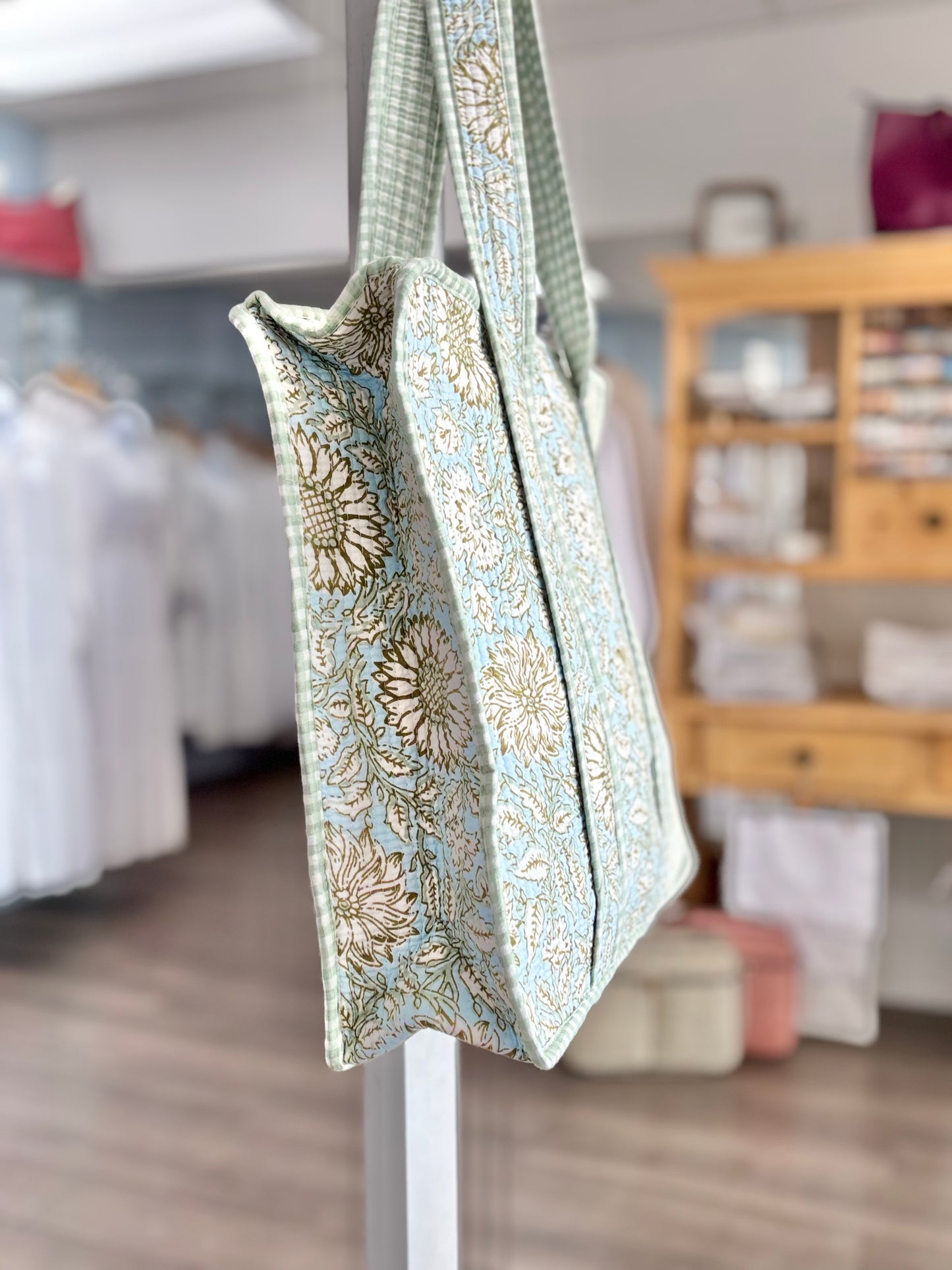 green and blue quilted bag