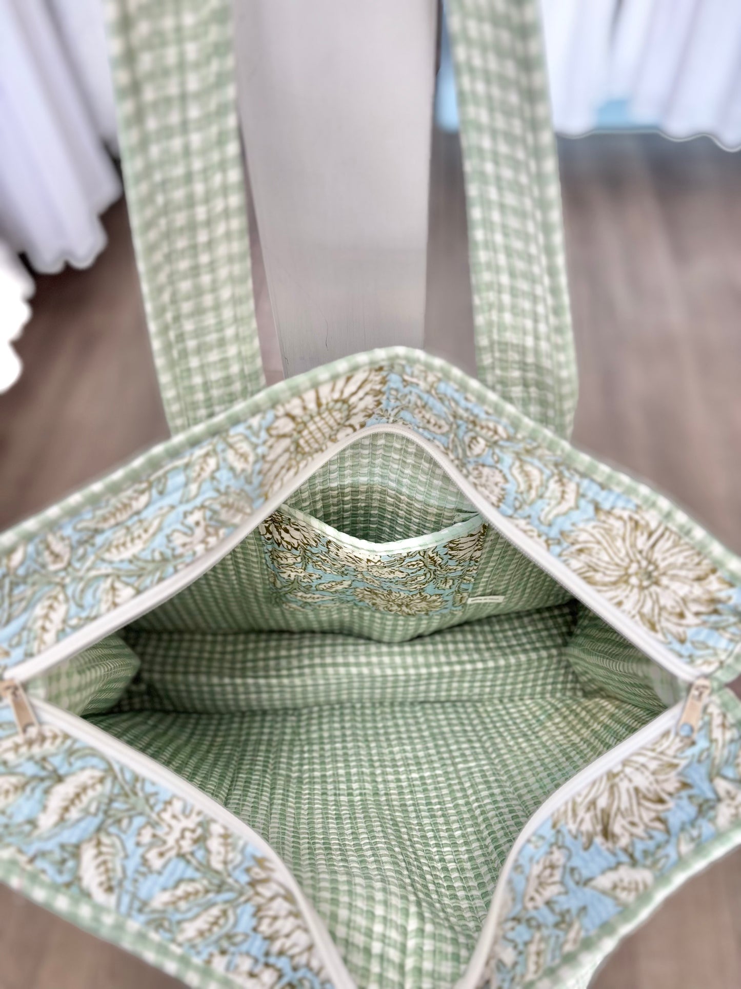 green and blue quilted bag