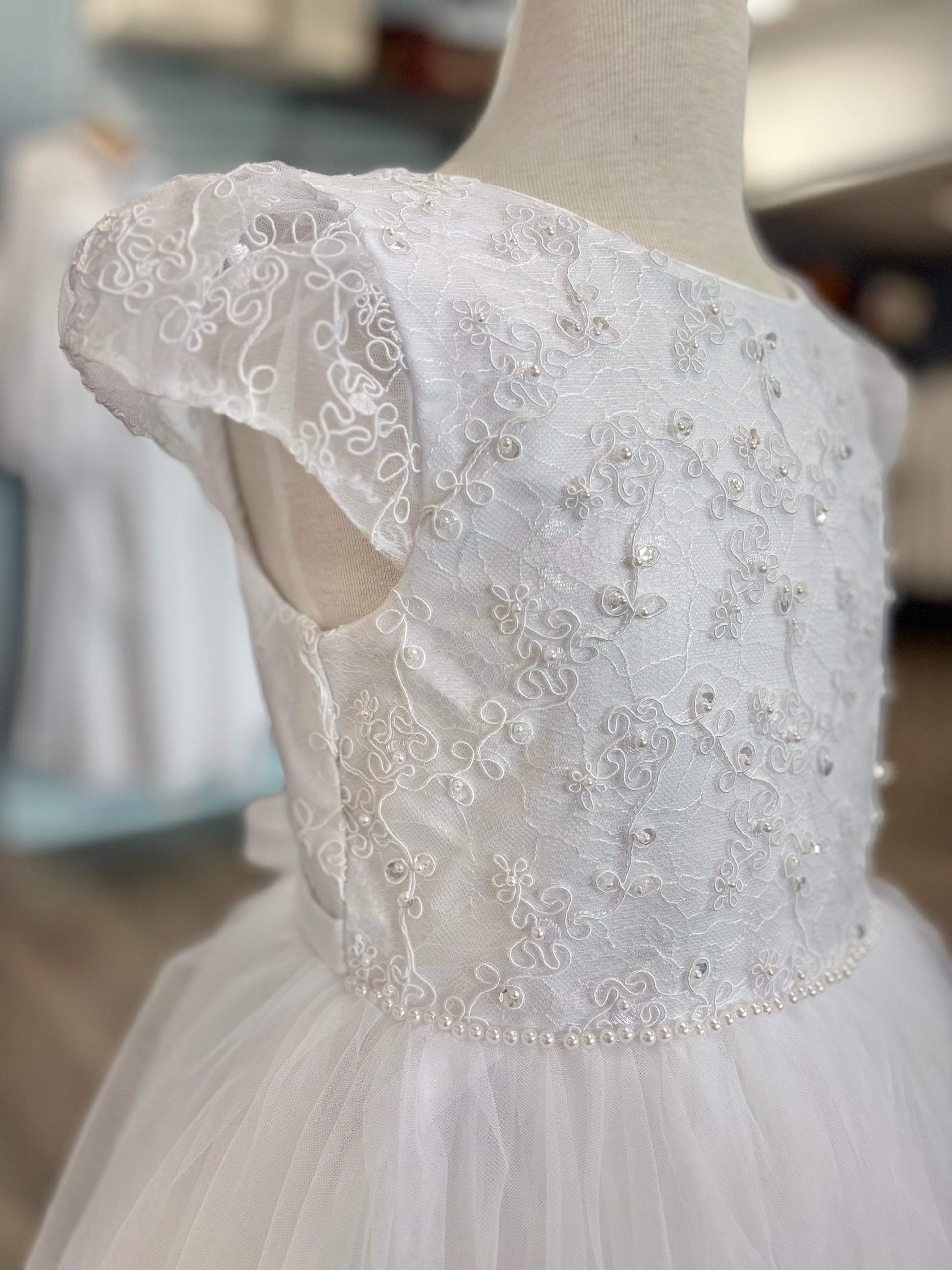 girl's white dress with beaded bodice