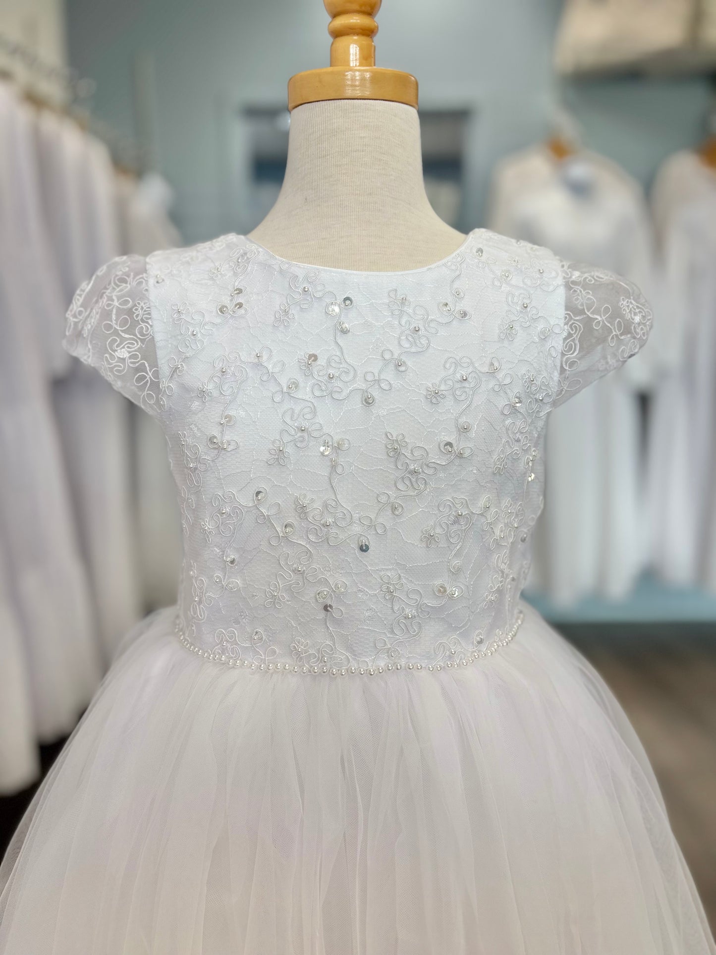 girl's white dress with beaded bodice