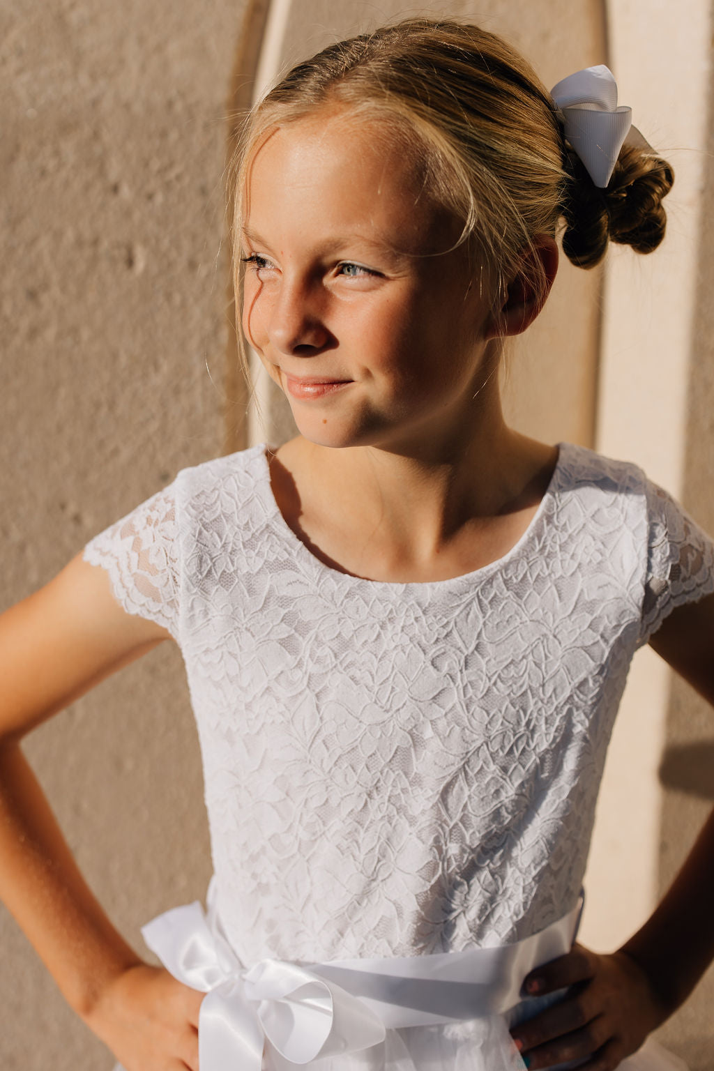 girl in white dress with tulle skirt