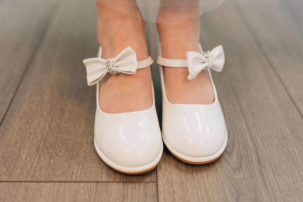 girls white heels with strap and bow