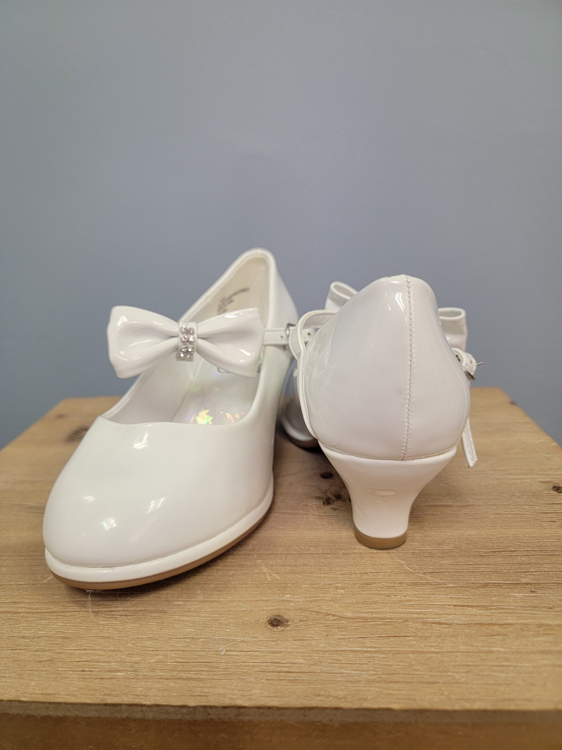 girls white heels with strap and bow